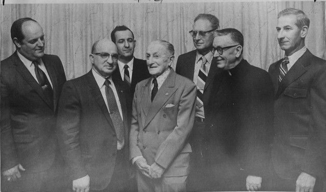 From the Archives:  Gathering of local chiefs in the Westerly Sun on 4/10/72.  The caption reads: &quot;Some of the top fire officials in the area gathered at the Narragansett Inn, Watch Hill Saturday night for the annual Dunn's Corners Fire Department banquet.  Shown (from left to right) they are, Chief Charles Barber, Watch Hill; Henry M. Morris, Dunn's Corners; Fred Stanley, Hope Valley; Columbus J. Pasetti, Westerly; Fred Main, Cross Mills; Rev. Harold Flynn, pastor of St. Clare's Church, Misquamicut and local area fire chaplain, and Chief G. Byron Champlin Jr., Ashaway.  More than 150 firemen and their guests enjoyed a roast beef dinner and heard firemen stress the importance of mutual aid in firefighting.  Robert M. Mudge, Dunn's Corners Fire District Moderator was the toastmaster.  Fr. Flynn gave the invocation, and following the speaking program, dancing was enjoyed.&quot;